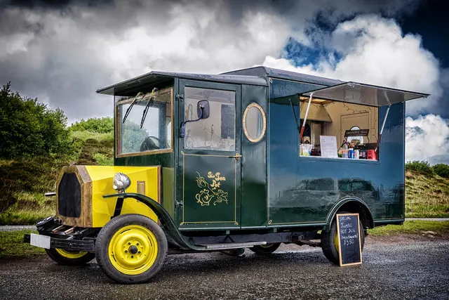 antique car, automobile, classic, old, kiosk, snack, hot dog, historical, vehicle, on the way, meal, booth, scotland, parking spot, sale, food, trifle, hunger, coffee, green, truck